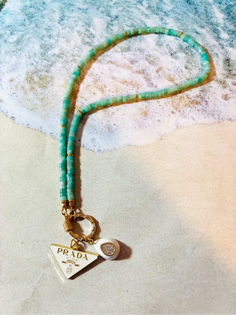 Prada Turquoise Bead Necklace with Gold Logo Charm